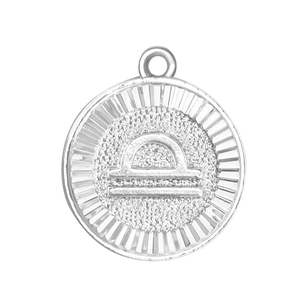 Silver Libra zodiac necklace pendant with a matte finish and radial striped border