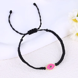 Handmade black woven bracelet with pink evil eye gold plated charm for men and women