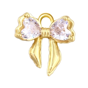 Elegante holle strikhanger met hartvormige zirkonia en goudkleurige metaalafwerking