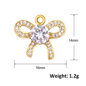 Macro-opname van gouden strikhanger 16mm x 14mm met kristallen voor DIY-sieraden maken