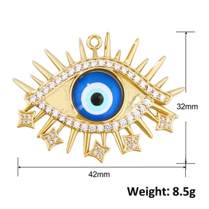 Ciondolo occhio blu placcato oro con zirconi e stelle pendenti, misura di 42 mm