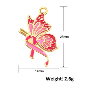 Detailed macro view of golden butterfly pendant with pink enamel ribbon for DIY jewelry