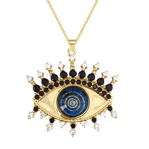 Golden evil eye pendant necklace with blue center eye and sparkling zircon stones