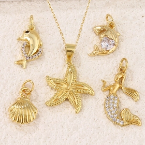 Pendentifs dorés sur le thème marin avec étoile de mer, sirène et dauphin pour bijoux