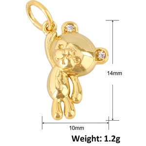 Detailed view of gold 3D bear pendant with zircon ears measuring 14mm by 10mm