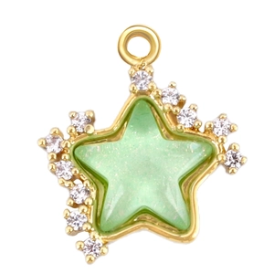 Golden star pendant with light green glitter inlay and sparkling cubic zirconia stones
