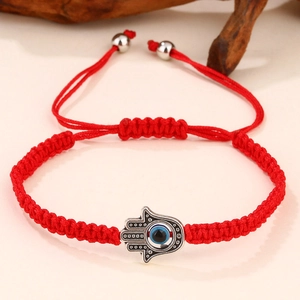 Bracciale intrecciato rosso mano di Fatima con ciondolo occhio blu e cordino regolabile