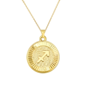 Detail of gold Sagittarius pendant with matte texture and radiant sunburst engraving