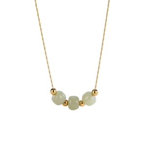 Minimalist 18k gold plated titanium steel necklace with pale green jade-like beads