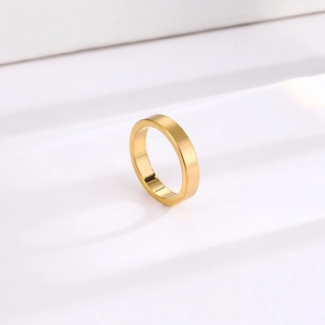 Minimalist 4mm polished gold titanium steel ring with a flat band design for women
