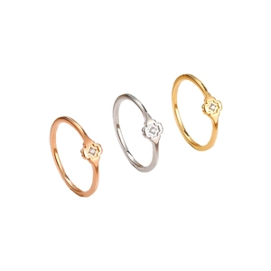 Three minimalist titanium steel clover rings in rose gold, silver and gold finishes