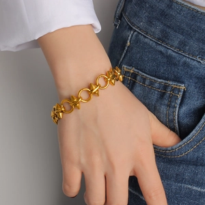 Bracelet punk minimaliste en acier inoxydable plaqué or 18K avec pointes et anneaux