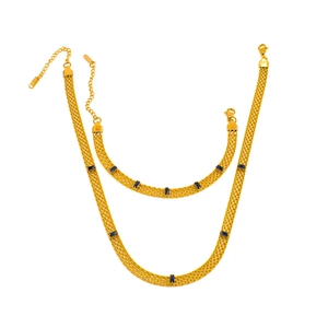 Detail of 18K gold plated mesh chain jewelry set with rectangle blue zircon gemstones