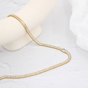 Luxurious 18K gold plated tennis chain set with white rectangular cubic zirconia stones