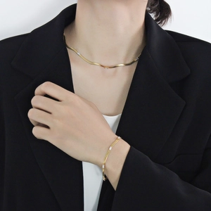 Gold-plated stainless steel snake chain necklace and bracelet set with cubic zirconia stones