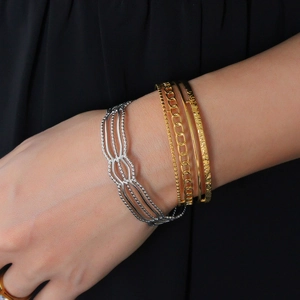 Fashionable stacked C-shaped bangle set with silver beads and golden Cuban chains