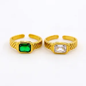 Détails de bagues ouvertes dorées avec zircons rectangulaires de couleur verte et blanche