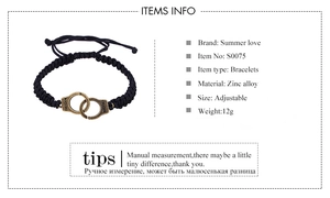 Detail of adjustable black woven handcuff bracelet with Freedom engraving on the metal