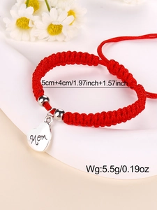 Detail of red braided bracelet with heart pendant and Mom engraving plus size specs