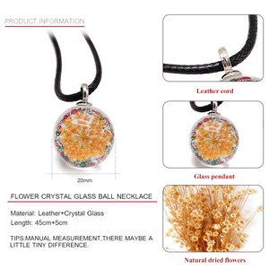 Handmade dry flower crystal ball necklace with yellow flowers and black leather cord