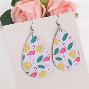 Faux leather teardrop earrings featuring tropical flamingo and palm leaf print designs