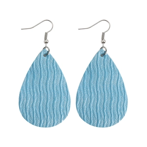 Textured light blue teardrop faux leather earrings with silver metal hooks on white