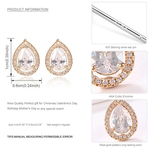 Detalle de pendientes de gota en oro rosa con halo de circonitas y sello S925 plata