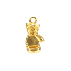 Macro detail of a golden boxing glove pendant with textured wrist patterns and top ring