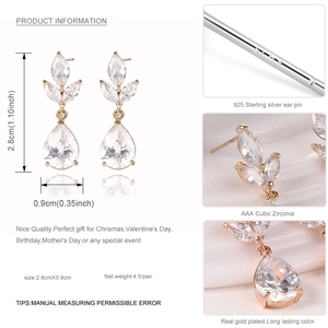 Detalle de pendientes de hoja dorados con dimensiones y sello de aguja de plata 925