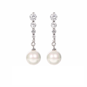 Pendientes largos con circonitas en degradé y una gran perla blanca redonda colgante