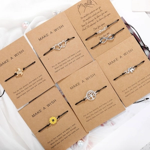 Set di bracciali intrecciati regolabili con albero della vita e ciondoli infiniti