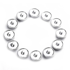 Set of 12 silver 20mm 12 Zodiac Noosa snap buttons with polished metallic finish