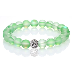 Detail of light green frosted moonstone beads and micro-pave crystal sphere stretch bracelet