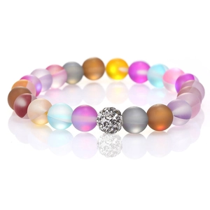 Frosted aurora moonstone stretch bracelet with a sparkling crystal paved sphere charm