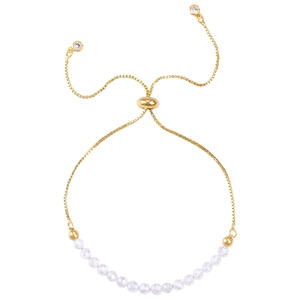 Detail of adjustable gold slider bracelet with faceted crystal beads and zircon charms