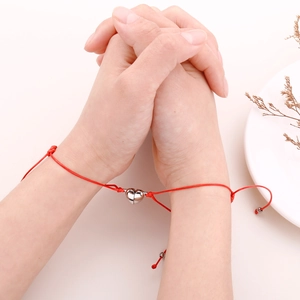 Magnetic heart red braided couple bracelets with polished metal charms for lovers
