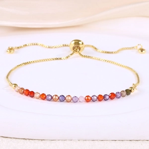 Detail of 3mm natural stone beaded bracelet with adjustable gold slider chain closure