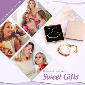 Detail of colorful crystal bead bracelet with gold chain and branded gift box