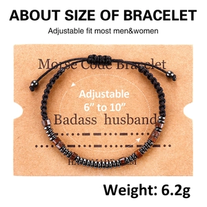 Detail view of Morse code bracelet for husbands with wood beads on a display card