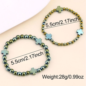 Dettagli dei bracciali elastici in ematite con ciondoli a croce e misure dimensionali