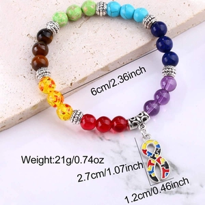 Detailed view of chakra healing bracelet with dimensions and colorful puzzle ribbon charm