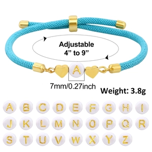 Detail of adjustable blue woven rope bracelet with gold letter A and heart charms