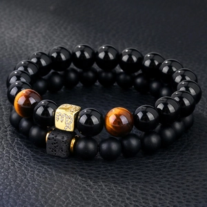 Macro shot of 8mm natural obsidian and lava stone beaded bracelets for men