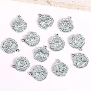 Pendentifs 12 constellations en acier inoxydable avec design en relief vintage pour DIY
