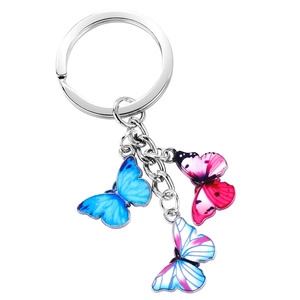 Vibrant butterfly keychain with three colorful pendants and polished silver-tone alloy ring