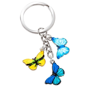 Detailed close-up of butterfly keychain featuring vibrant colorful enamel butterfly pendants