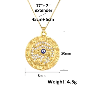 Gold evil eye pendant necklace with zircon crystals and hieroglyphs engraved detail