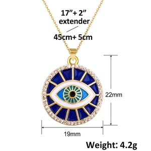 Detail of gold evil eye pendant with size specs, 22x19mm charm on 17+2 inch chain