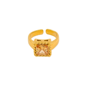 Detail of vintage gold ring with large square champagne zircon and woven rope texture