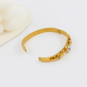 18K gold plated stainless steel floral bangle with center zircon crystal stone